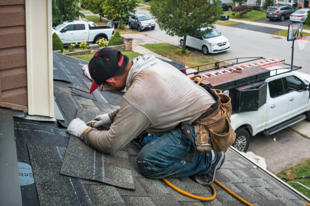 Professional Roofing technician working in Indio, CA